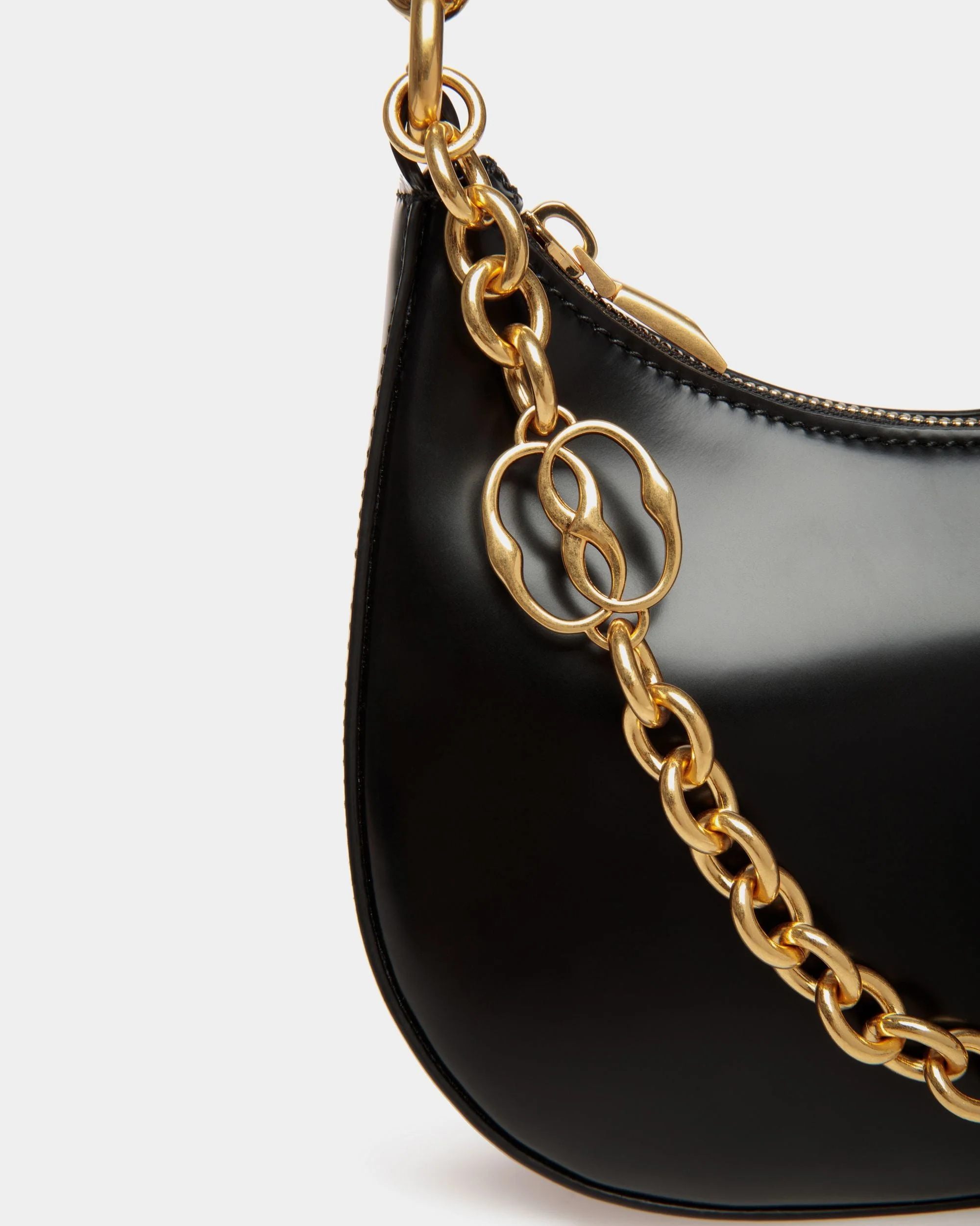 Emblem Mini Crossbody Bag in Black Brushed Leather - Image 6