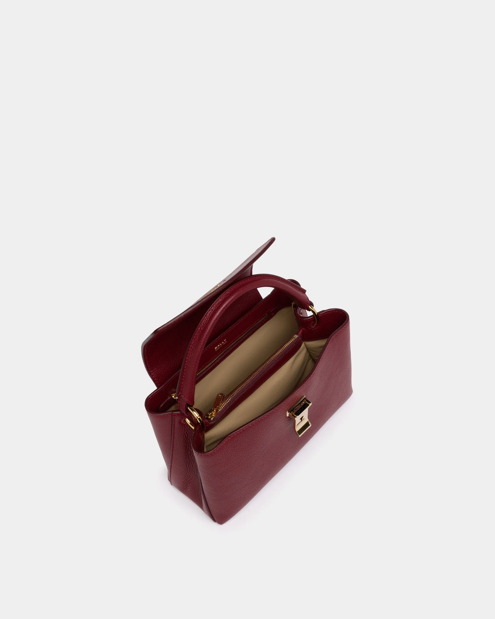 Lock Me Small Top Handle Bag in Ruby Red Grained Leather - Image 4